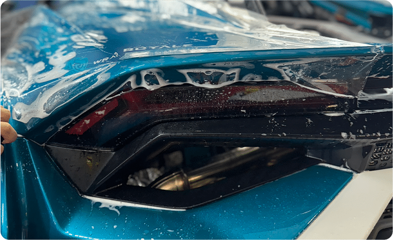 Paint protection film (PPF) installation on luxury vehicle in Orlando FL