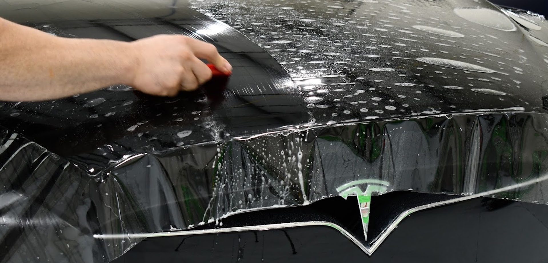 Paint Protection Film (PPF) installation on luxury vehicle in Orlando FL by Wrap Royale