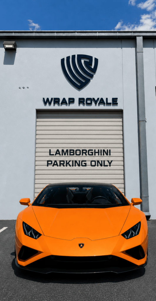 Luxury Lamborghini parked in front of Wrap Royale in Orlando, FL, showcasing premium vehicle wraps, Paint Protection Film (PPF), ceramic coatings, and exotic car customization at our veteran-owned luxury car wrap shop.